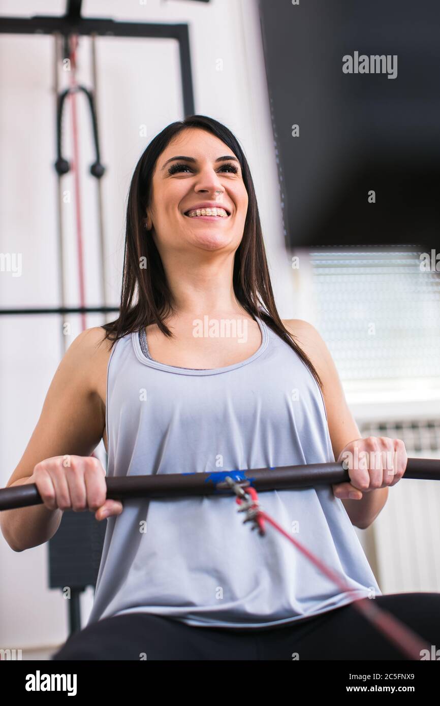 fit young woman exercising at the gym Stock Photo - Alamy