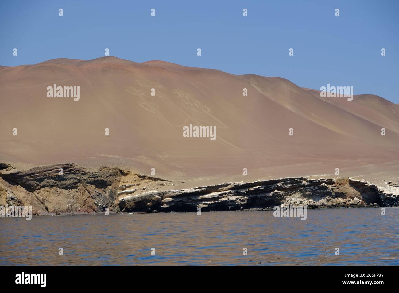 Peru Paracas - Prehistoric geoglyph Candelabro on a seaside hill Stock Photo