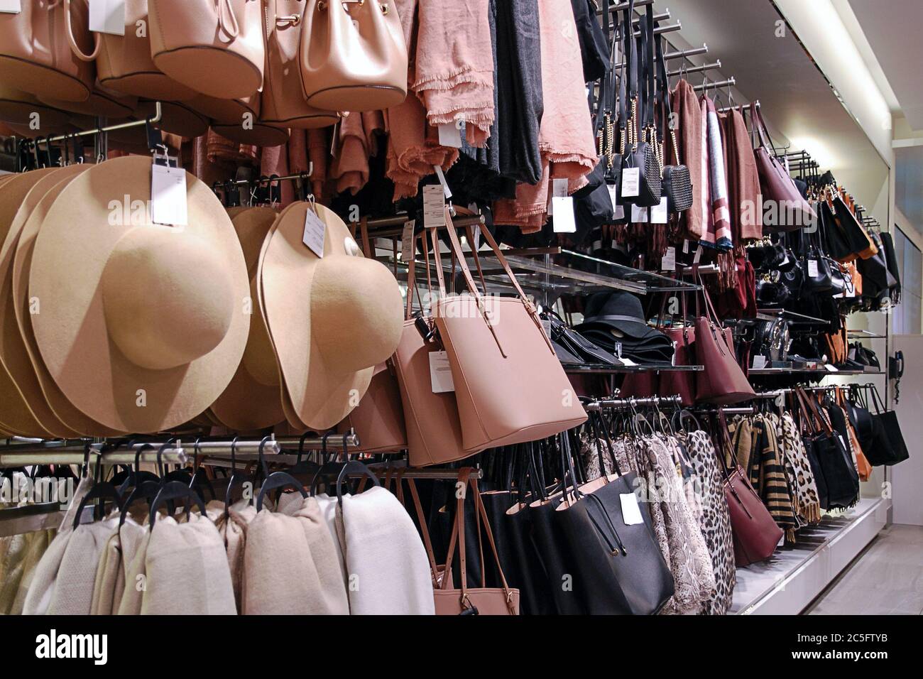 Women hats and bags in accessories shop Stock Photo Alamy