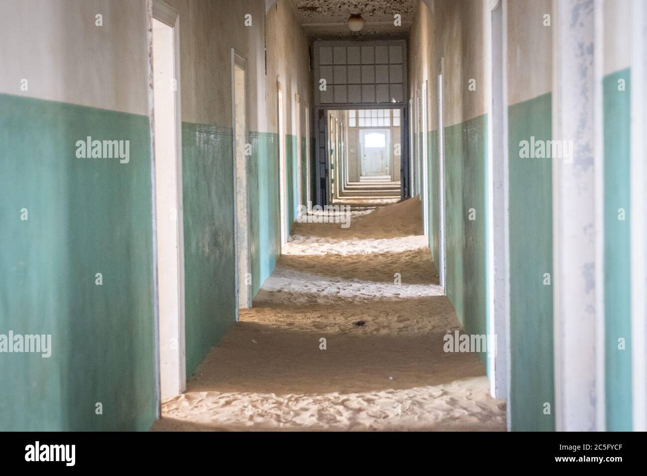The interior of a building in the ghost town of Kolmanskop , Karas Region, Namibia Stock Photo