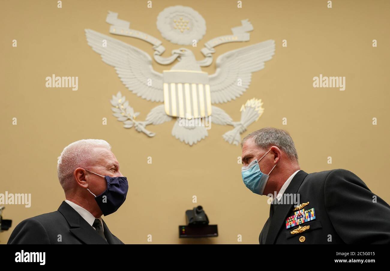 Washington, United States Of America. 02nd July, 2020. Admiral Brett Giroir, United States Assistant Secretary for Health speaks with Rear Admiral John P. Polowczyk, Vice Director, J4, Joint Staff at the start of a House Select Subcommittee on the Coronavirus Crisis hearing on 'The Administration Response to Ongoing Shortages of PPE and Critical Medical Supplies' on Capitol Hill in Washington, U.S., July 2, 2020. Credit: Kevin Lamarque/Pool via CNP | usage worldwide Credit: dpa/Alamy Live News Stock Photo