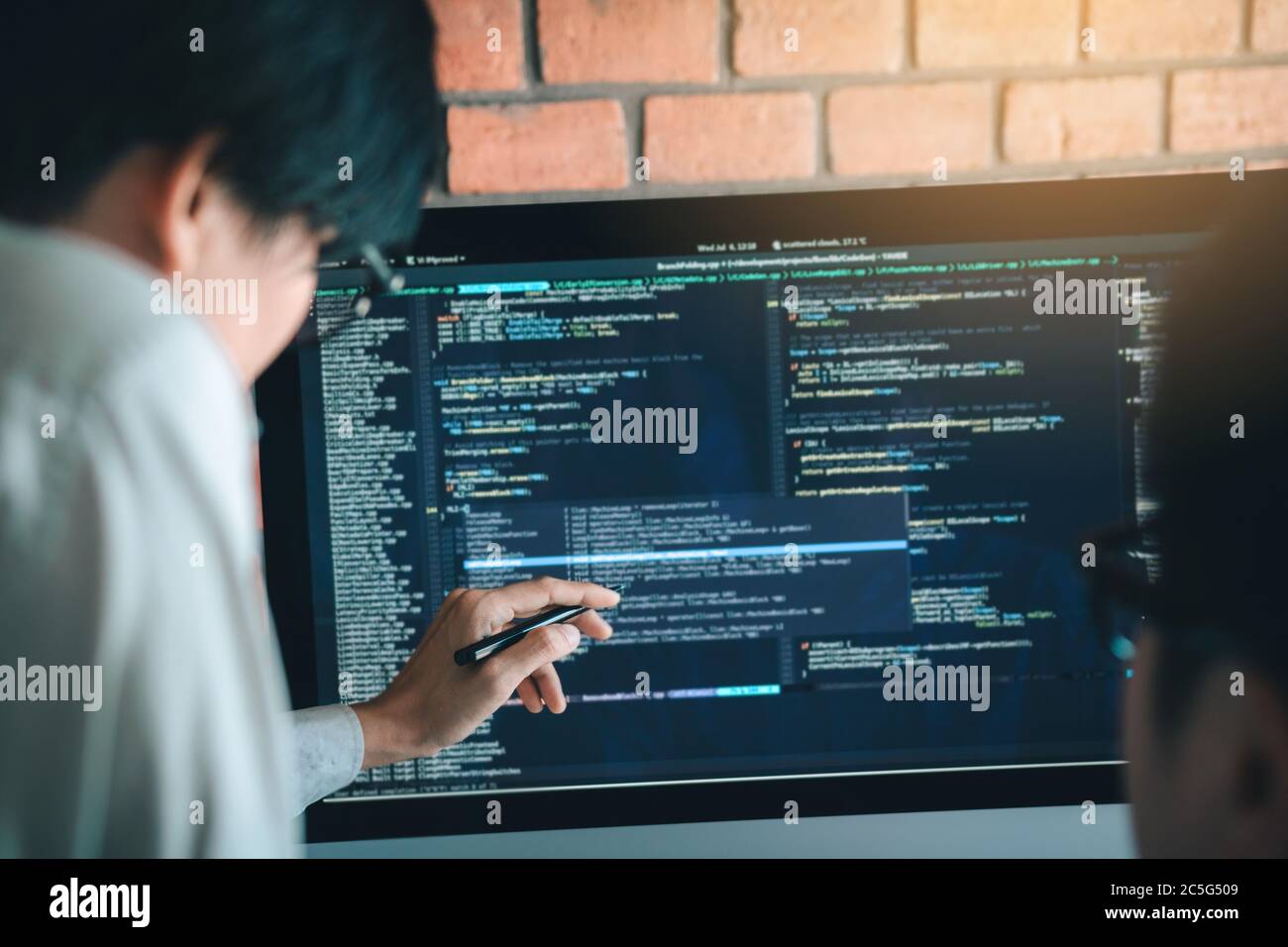 Developing programming and coding technology working in a software ...