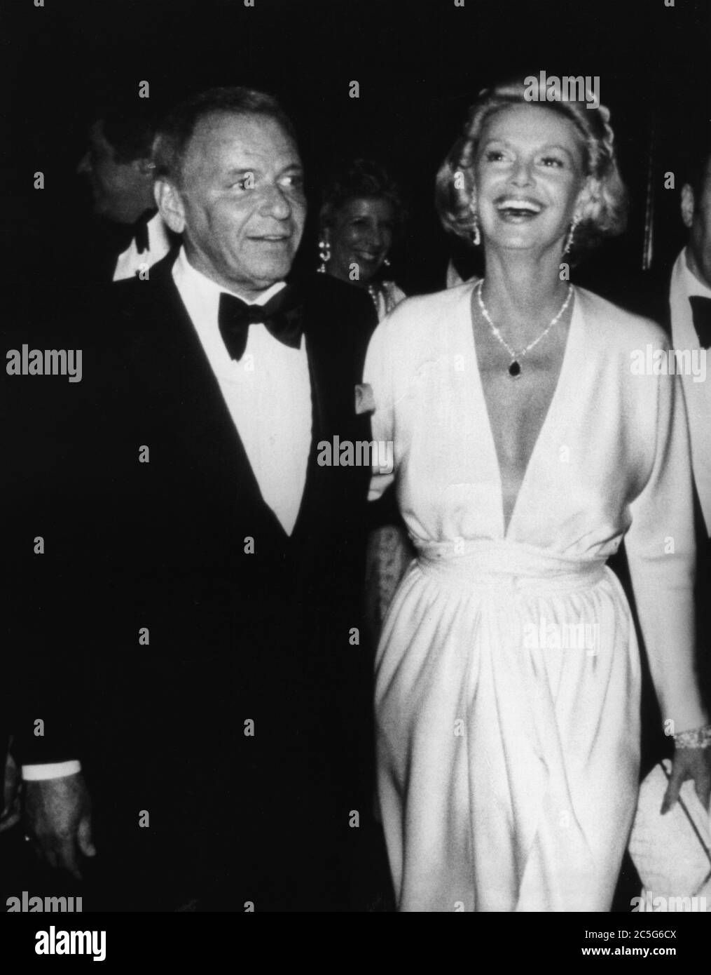 Apr 27, 1977 - New York, New York, USA - Singer FRANK SINATRA with wife BARBARA arrive at the Waldorf Astoria Hotel. The marquee of the Park Avenue hotel entrance will be covered with a banner proclaiming it ''Frank's Place,'' a real Italian trattoria where a gala party, hosted by Gov. Carey, will be held after the Frank Sinatra Robert Merrill concert at Carnegie Hall for the benefit of Lenox Hill Hospital and the Institute of Sport Medicine. This marks the second time the Waldorf's Park Avenue entrance has ever been closed for a special event.  (Credit Image: © Keystone Press Agency/Keystone Stock Photo