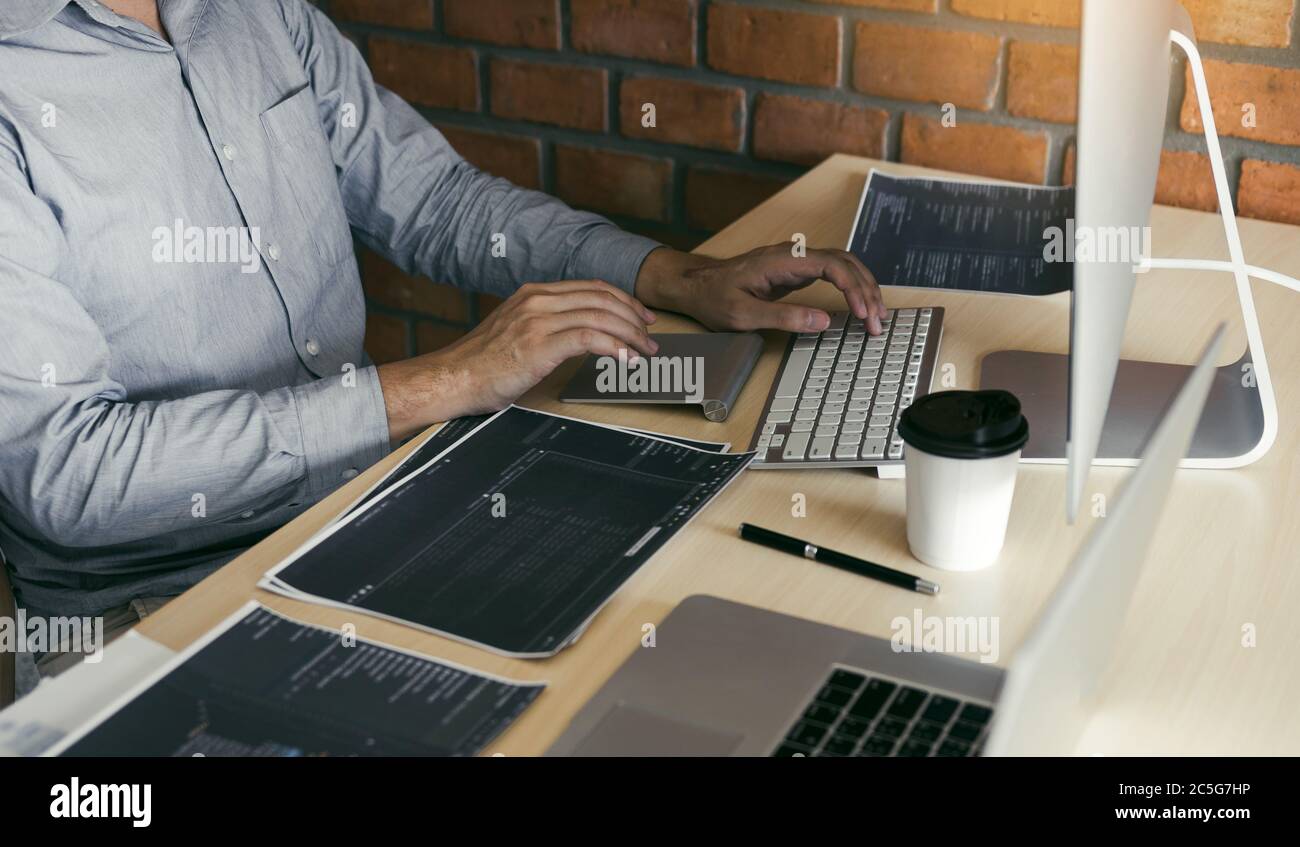 Stress developing programming looking coding technology working on computer. Stock Photo