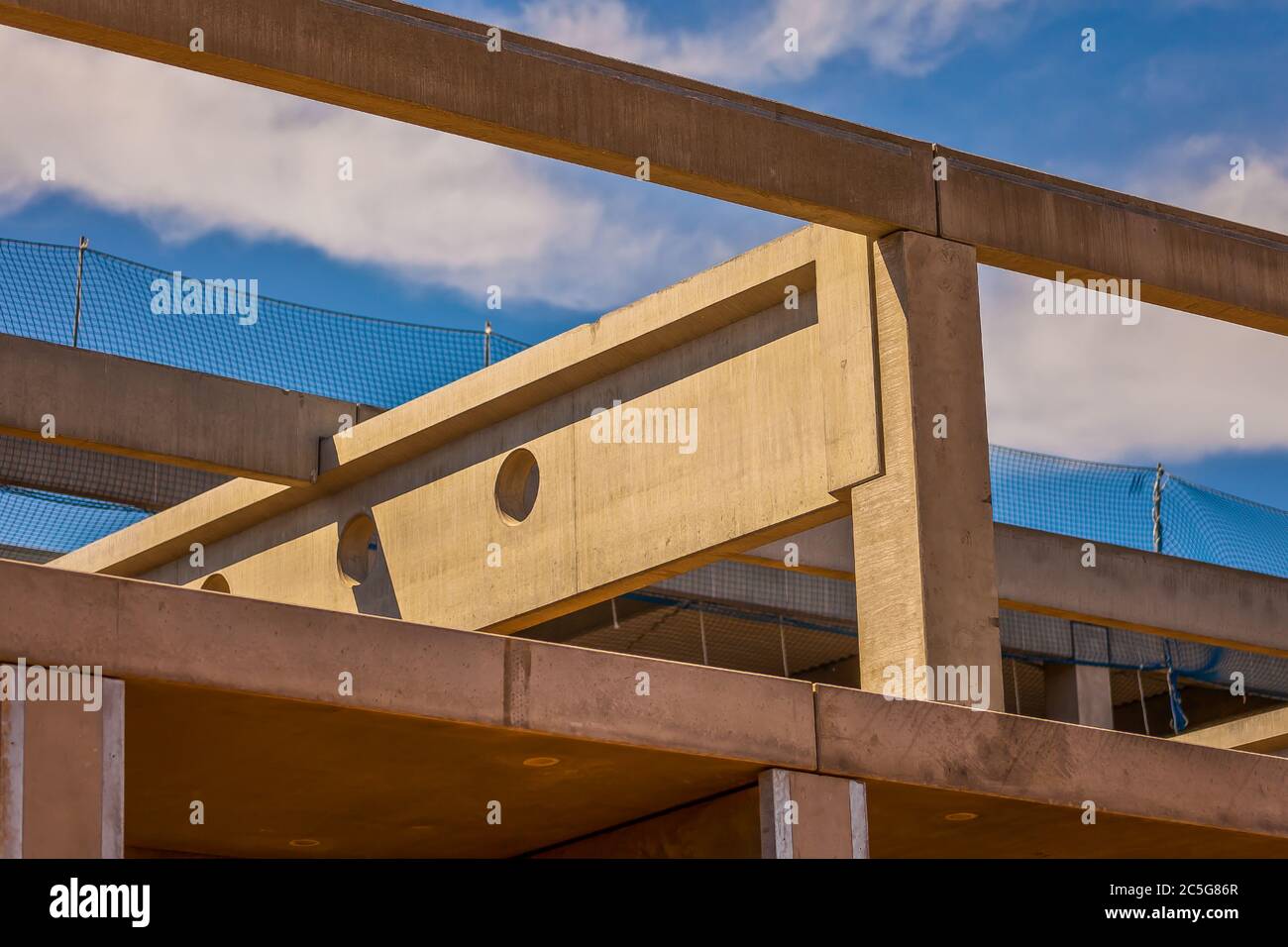 Construction site with precast concrete columns, beams and walls Stock Photo