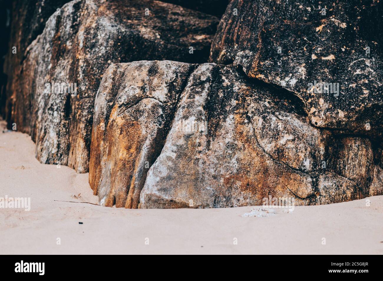 sand and rocks in jungle beach Sri Lanka Stock Photo