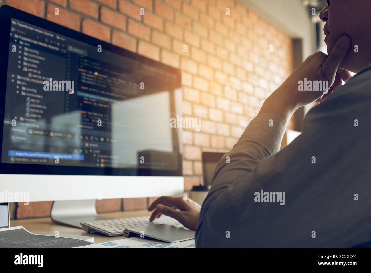 Developing programming and coding technology working in a software develop company office. Stock Photo
