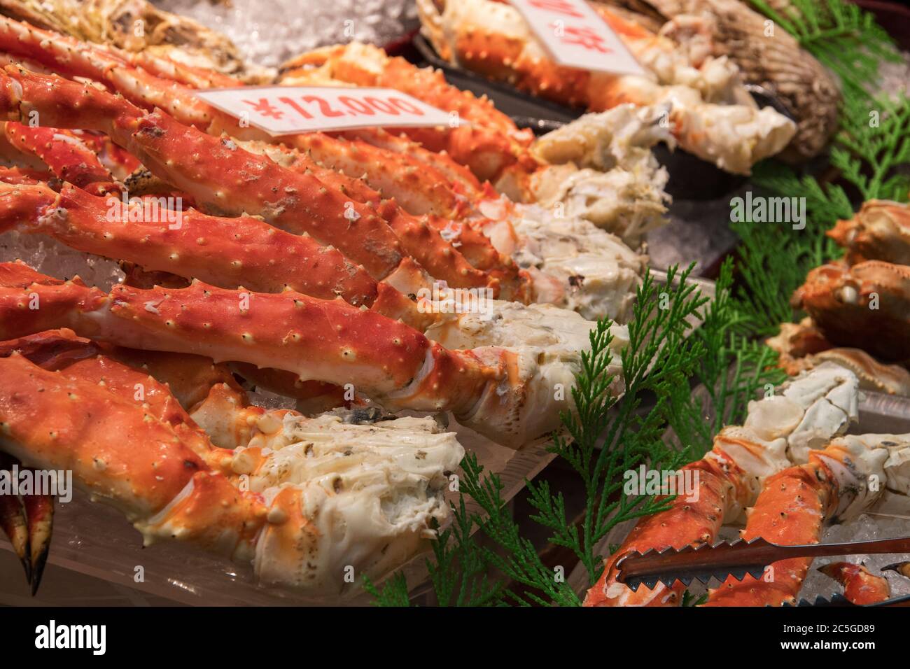 King crab legs ready to serve for customer at Kuromon market in Osaka
