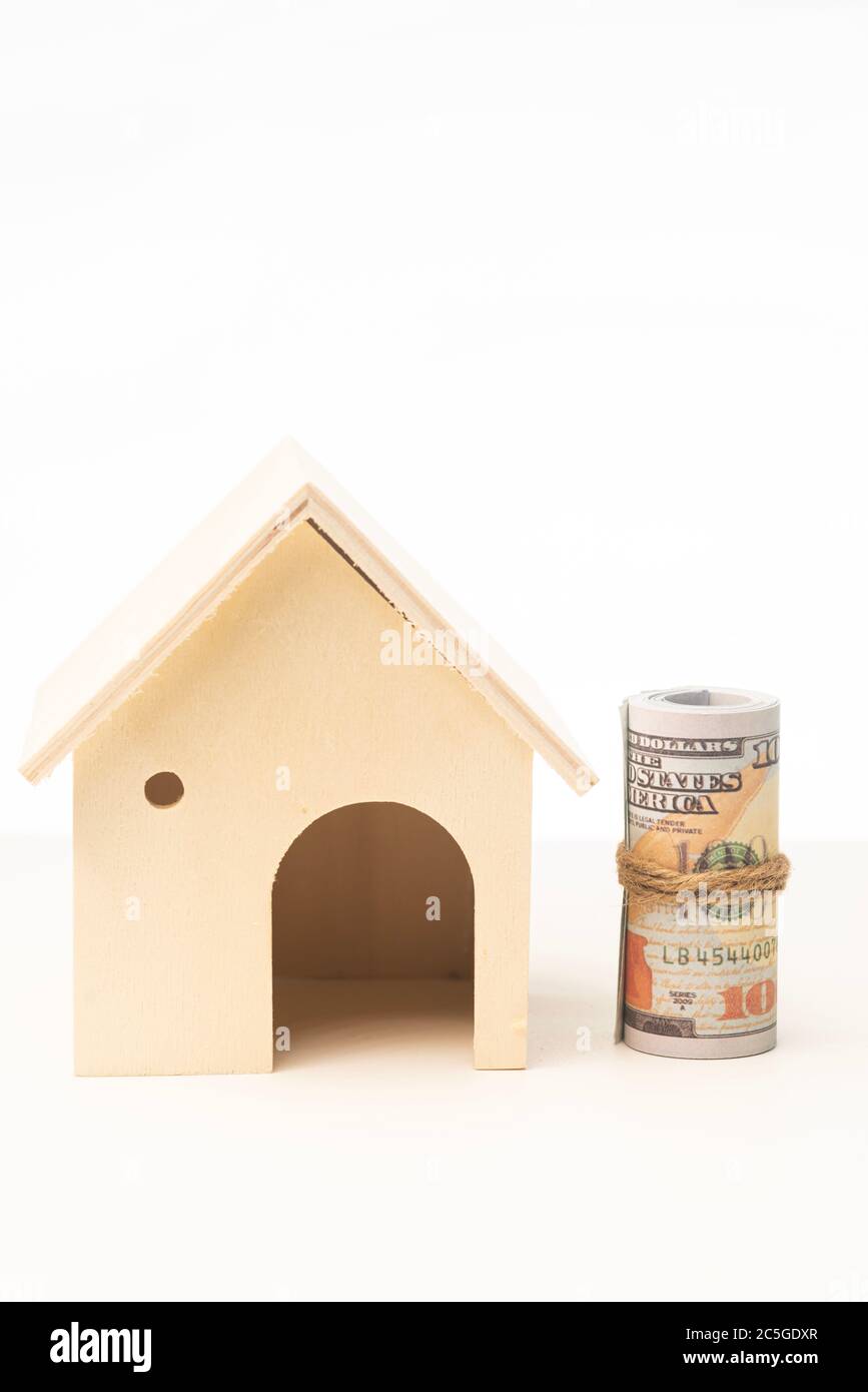 Miniature wooden house isolated against white background Stock Photo ...