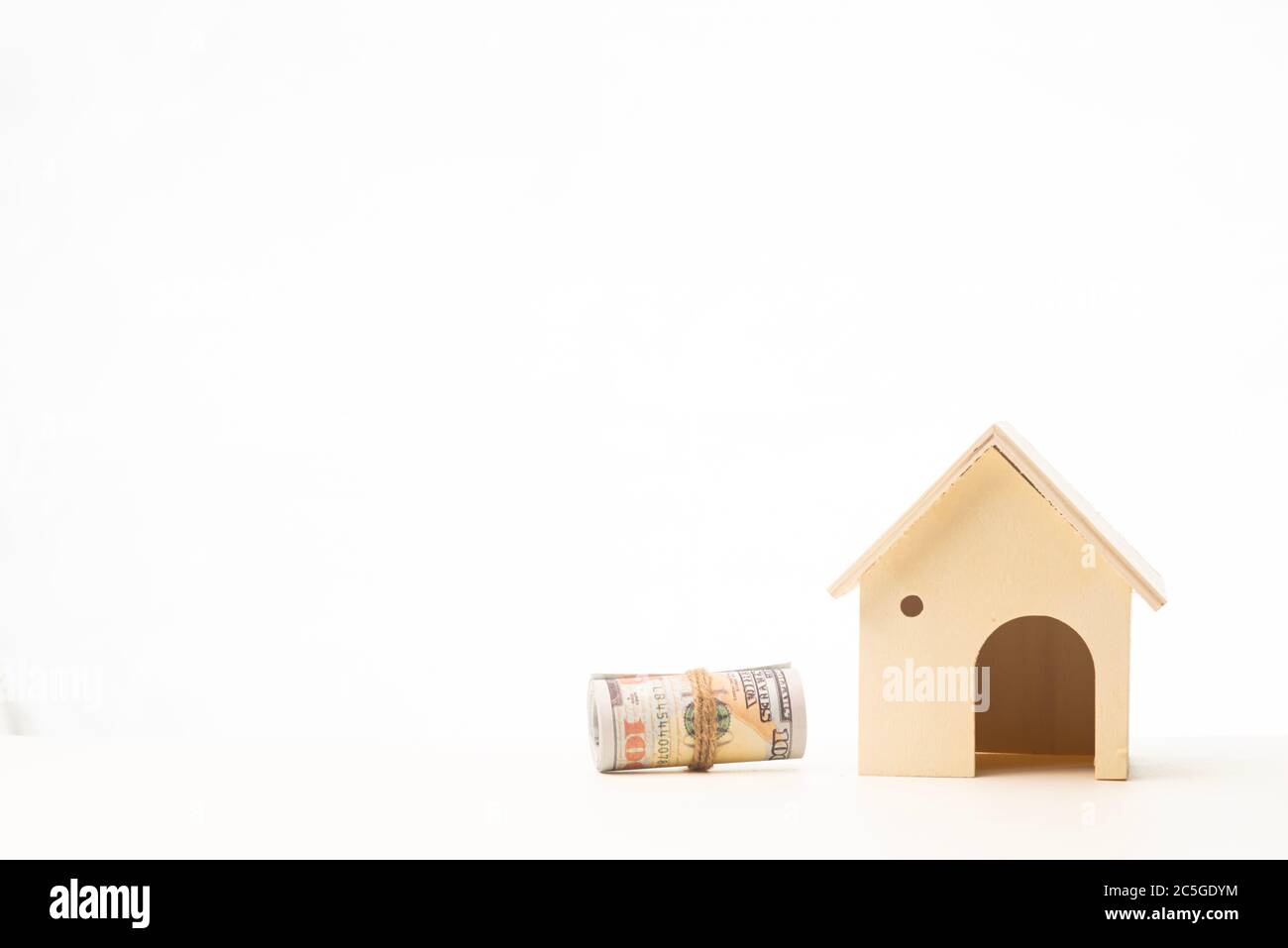 Miniature wooden house isolated against white background Stock Photo ...