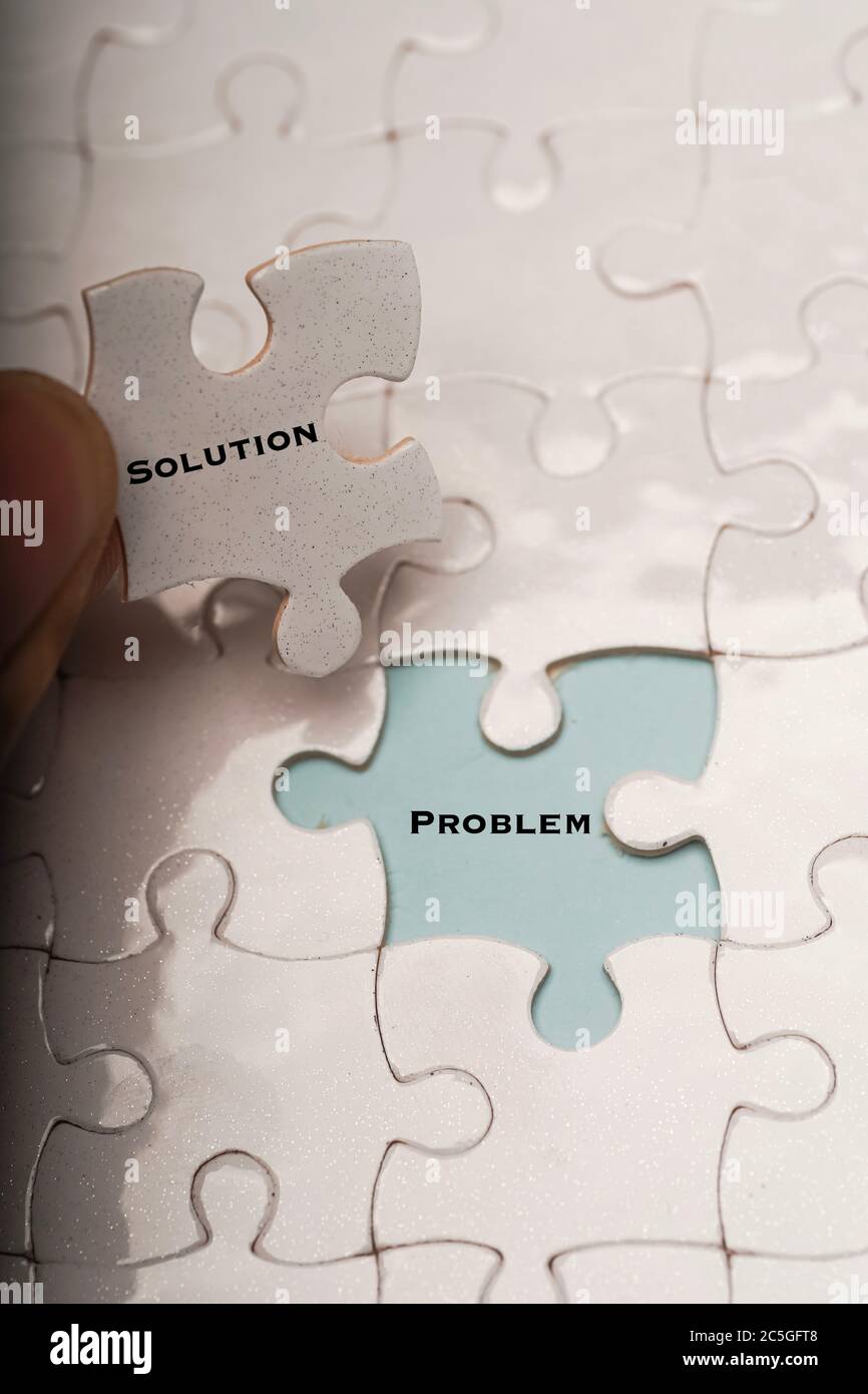 Problems Using Puzzles Teamwork solve problem hi-res stock photography and images - Alamy