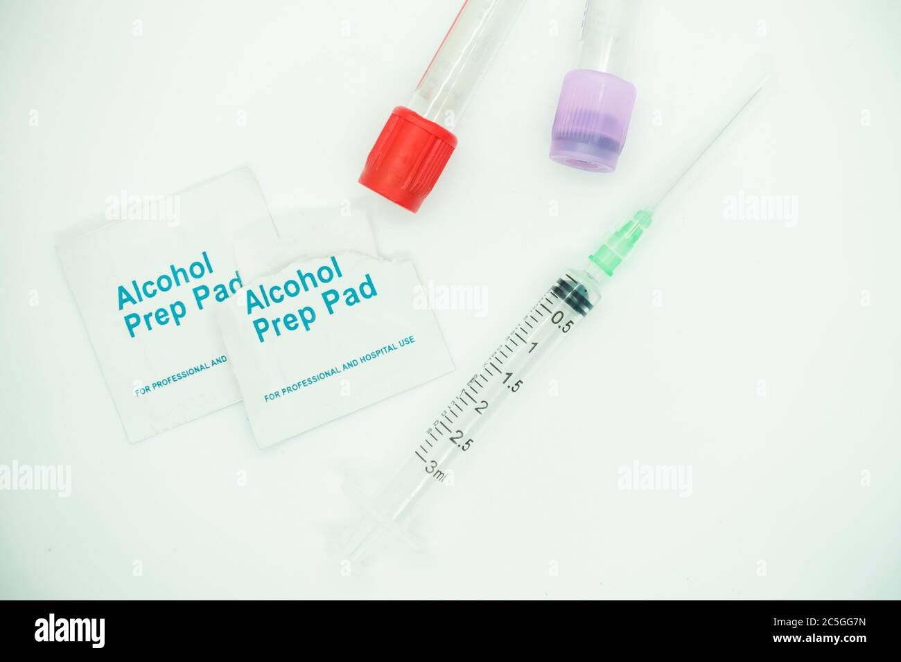 blood taking kit, empty syringe with needle, blood collection tube and alcohol swab, medical concept Stock Photo