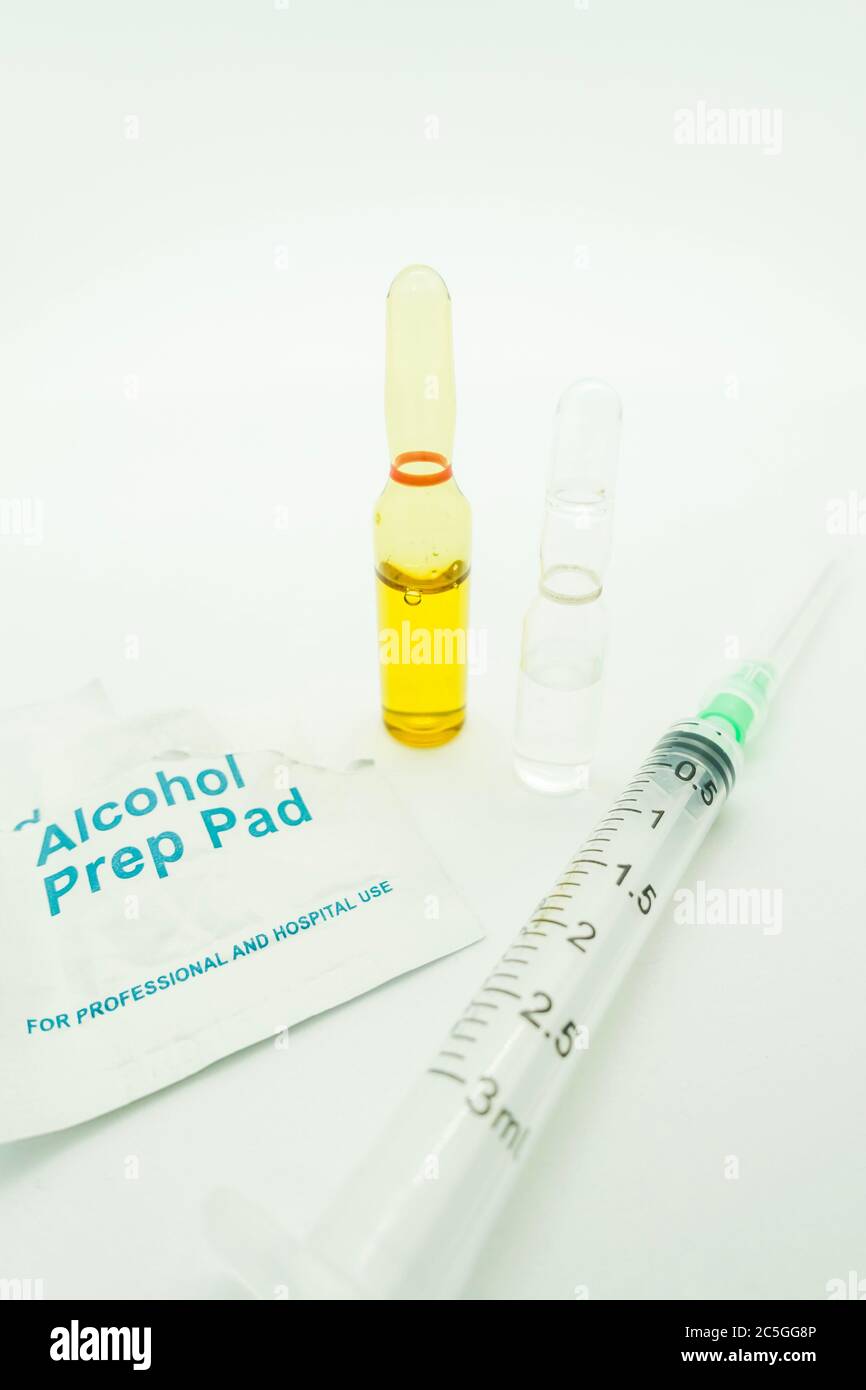 Medication ampoules for Intravenous injections on a wooden background ...