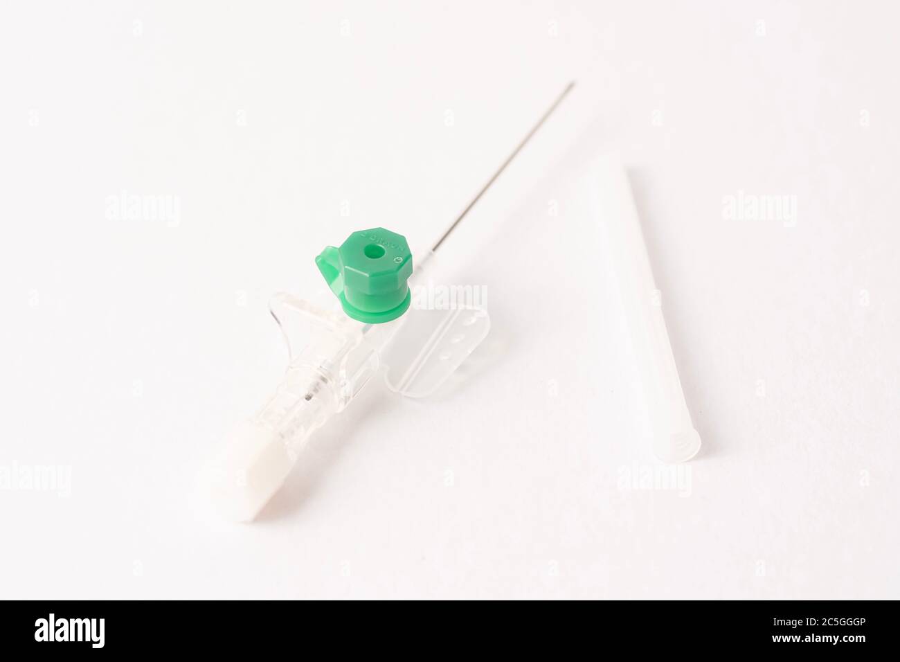 Intravenous cannula or Branula isolated against white Stock Photo