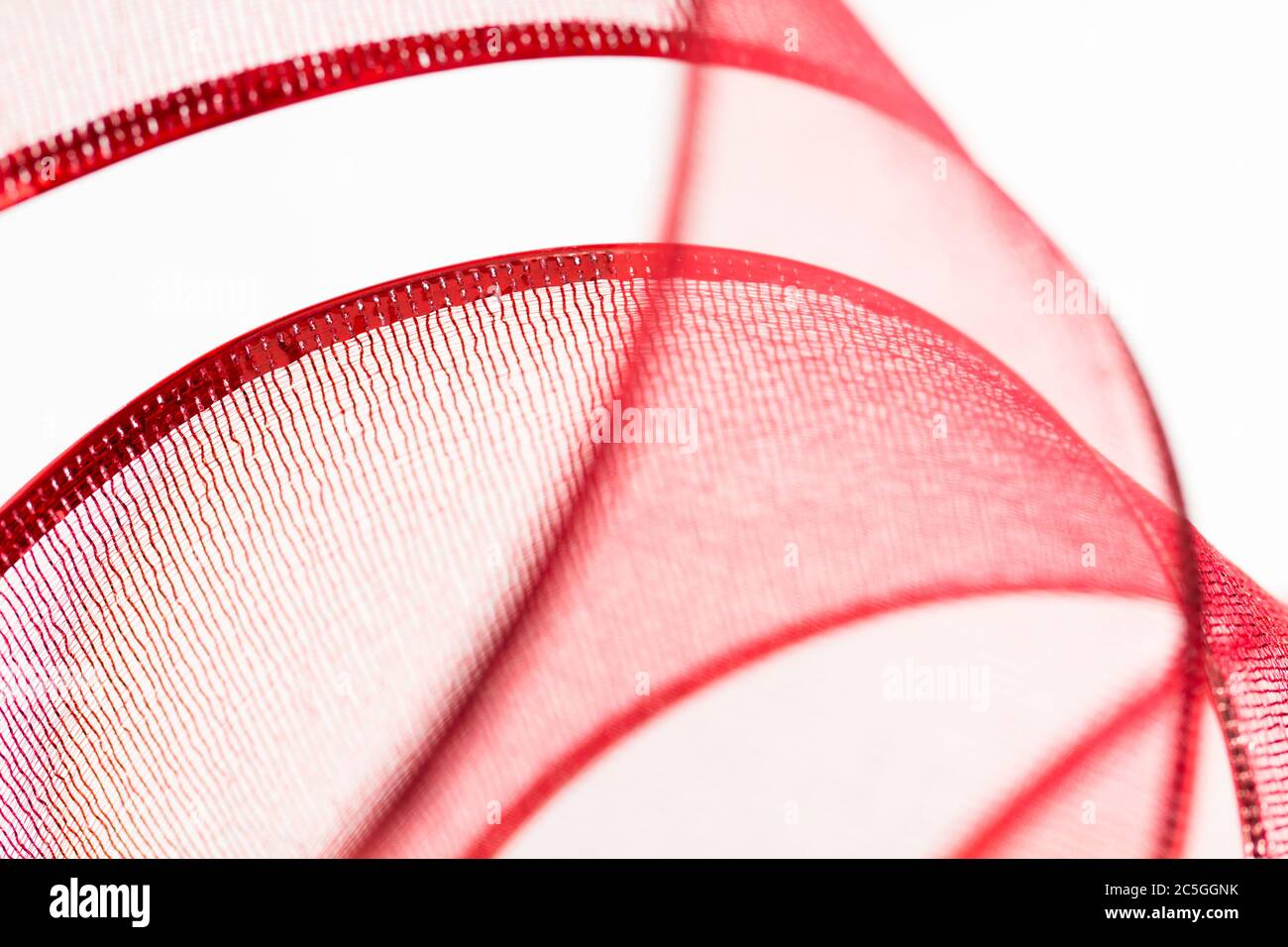 Abstract background with close up of metallic mesh ribbon loops. Stock Photo
