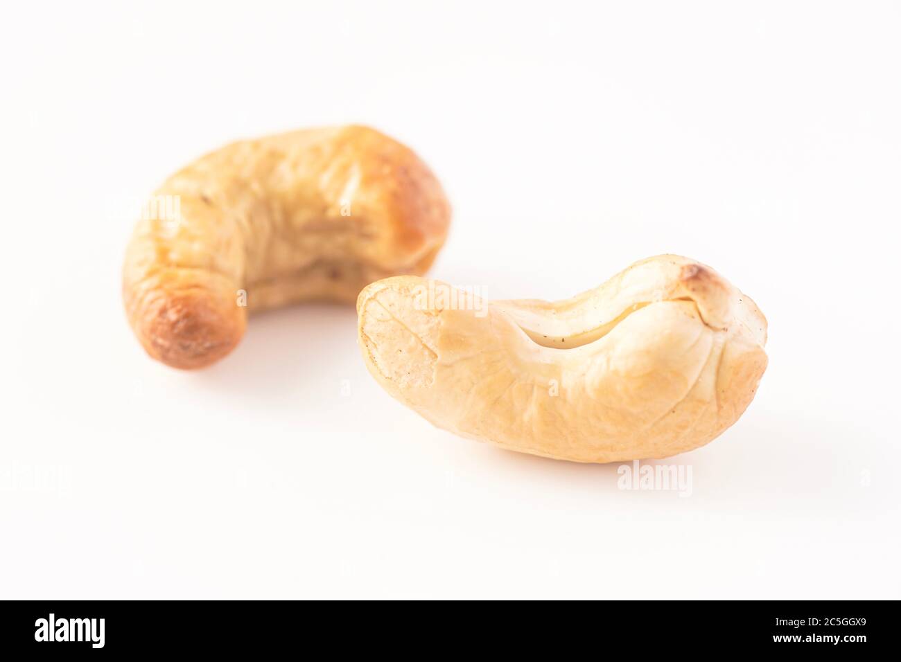 Cashew nuts isolated against white Stock Photo