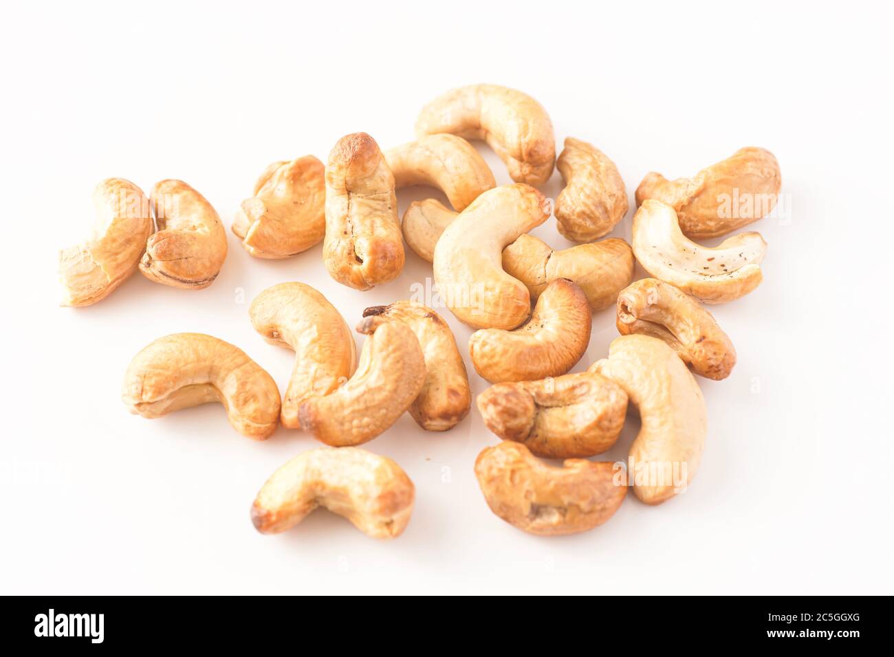 Cashew nuts isolated against white Stock Photo