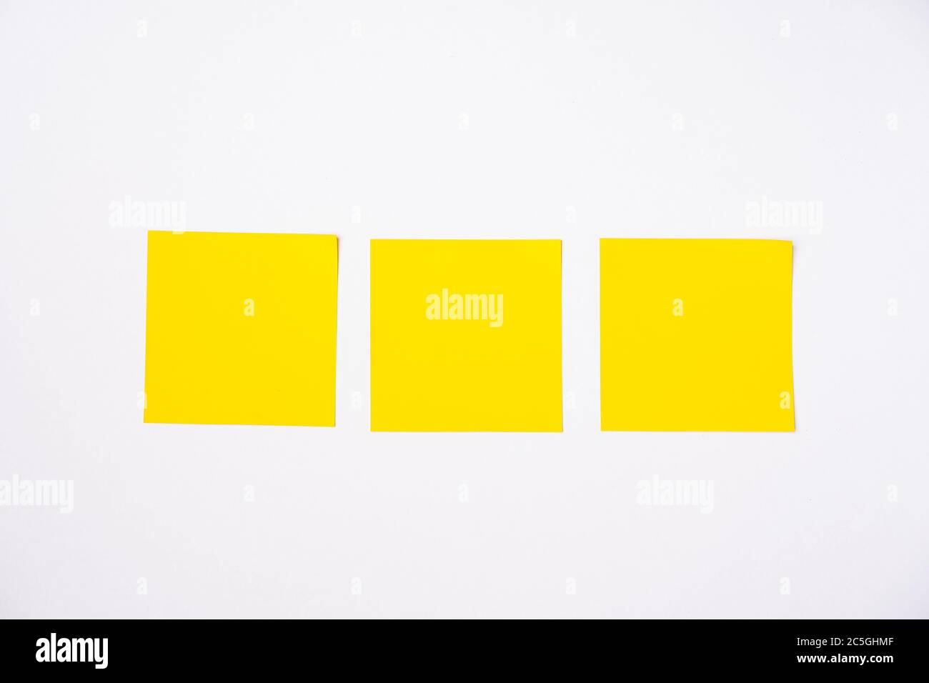 Sticky notes against white background, copy space for text Stock Photo