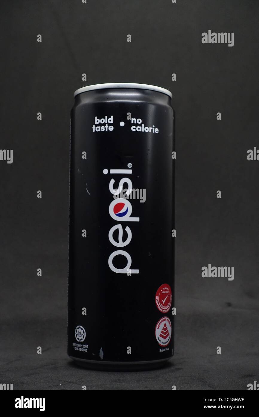 A can of pepsi black against isolated black background, a zero calories