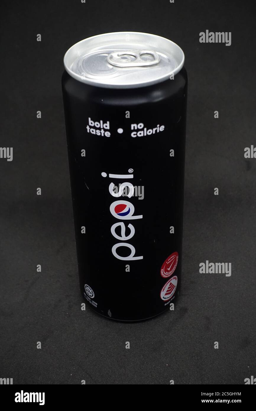 A can of pepsi black against isolated black background, a zero calories