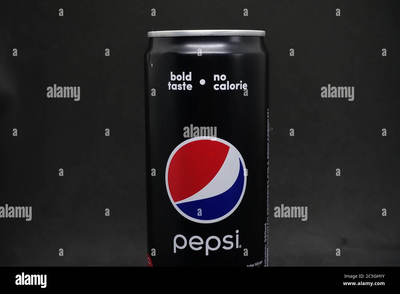 A can of pepsi black against isolated black background, a zero calories