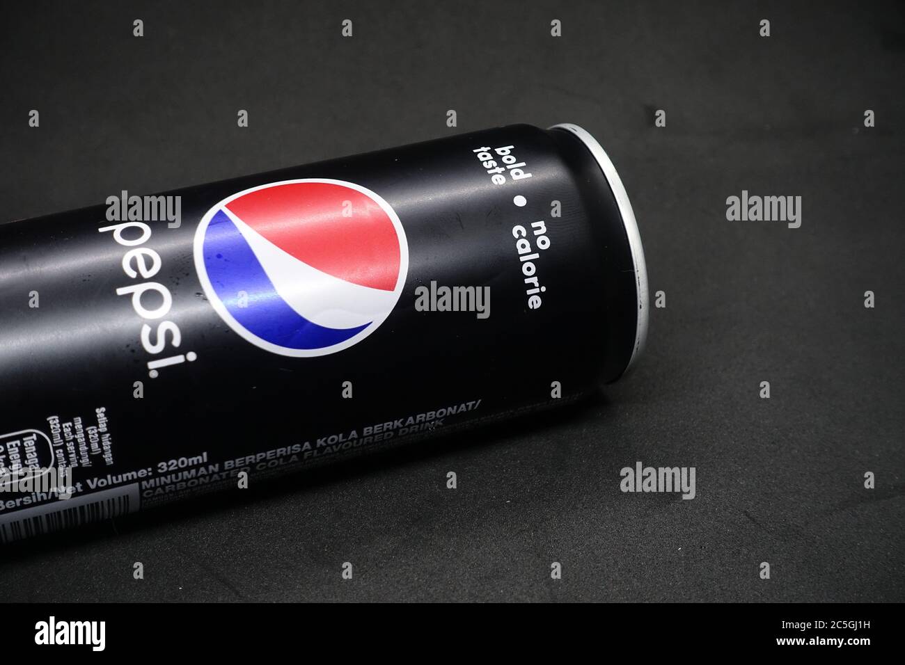 A can of pepsi black against isolated black background, a zero calories ...