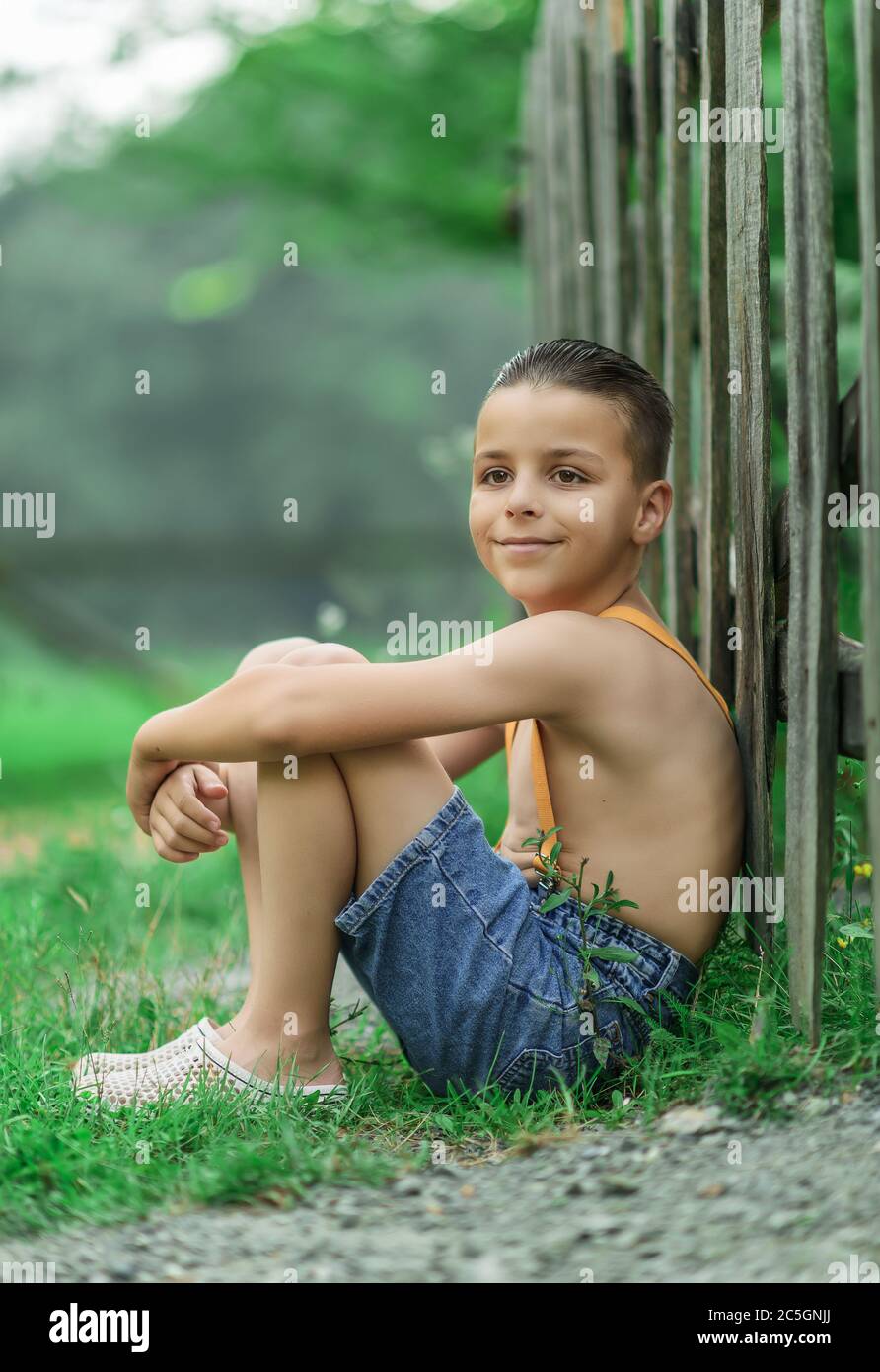 portrait of a boy outside Stock Photo - Alamy