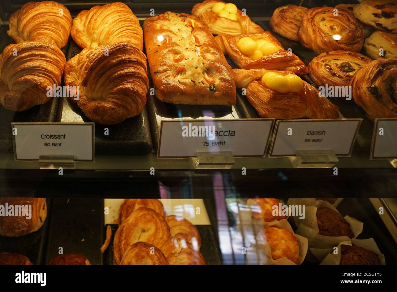 Assorted French pastry cake Danish roll, scone, muffin and croissant
