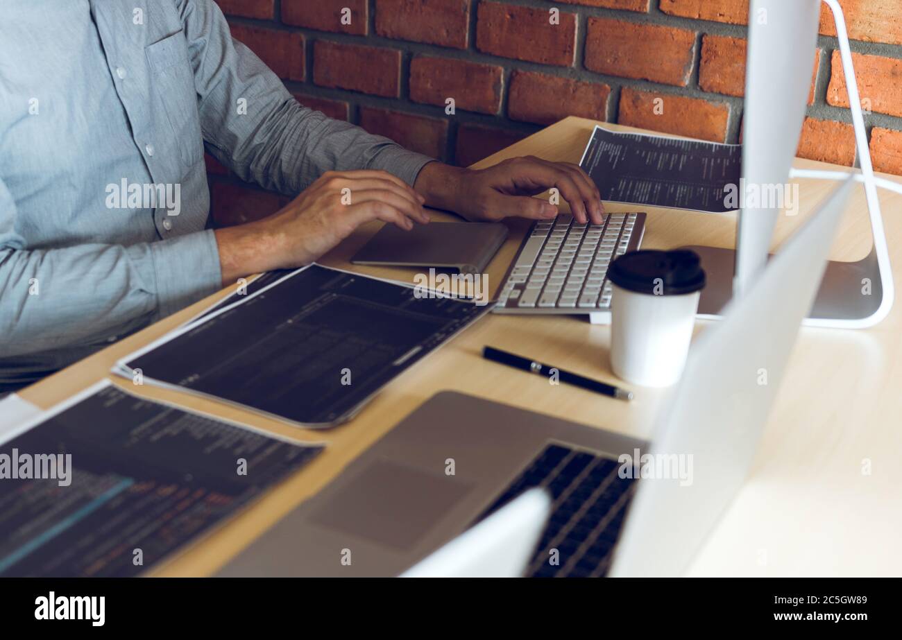 Stress developing programming looking coding technology working on computer. Stock Photo