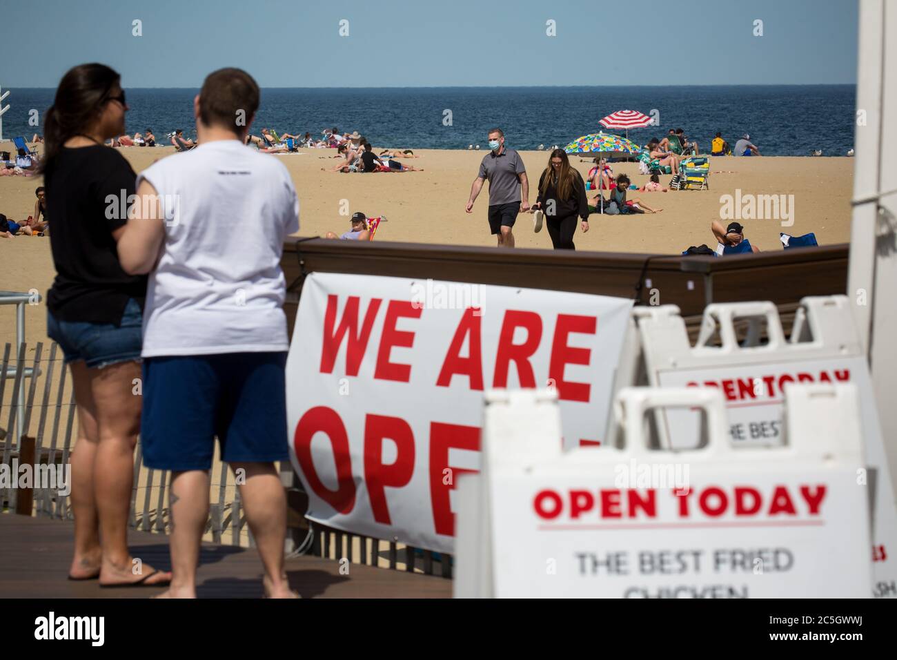 Beijing, USA. 16th May, 2020. Signs for a restaurant's open for takeout are displayed on the boardwalk at Belmar Beach amid the COVID-19 pandemic in Belmar, New Jersey, the United States, May 16, 2020. TO GO WITH XINHUA HEADLINES OF JULY 3, 2020 Credit: Michael Nagle/Xinhua/Alamy Live News Stock Photo