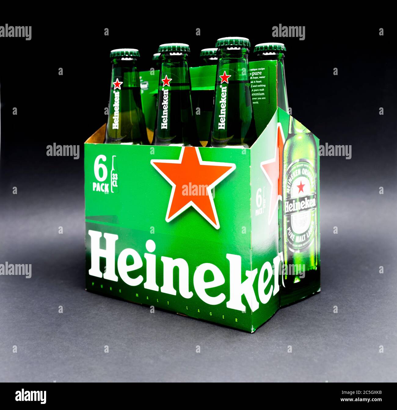 Sankt-Petersburg, Russia, Fenruary 02, 2020: Six pack of Heineken light lager beer on dark black background Stock Photo