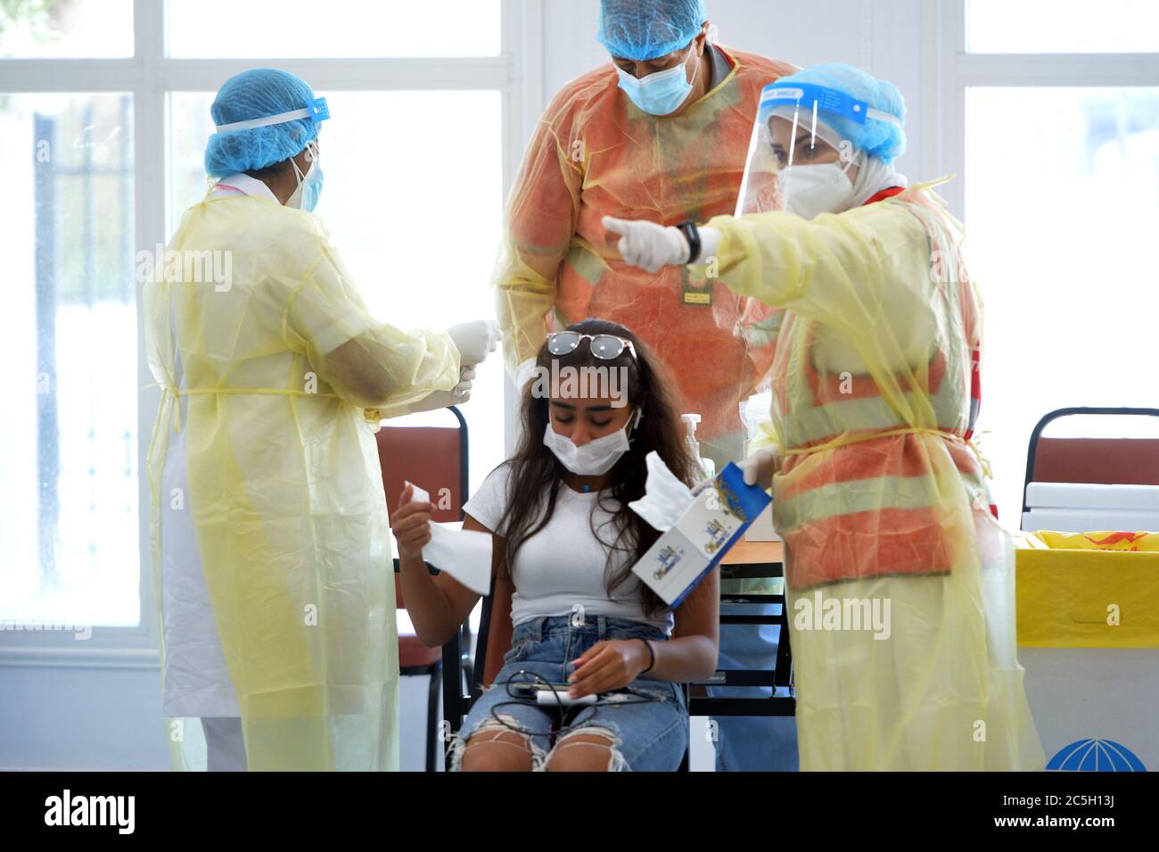 Kuwait City, Kuwait. 2nd July, 2020. An athlete receives medical check