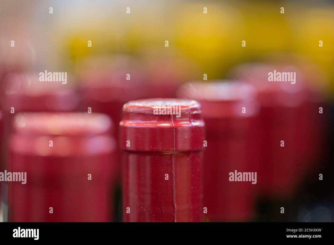 Close up of bottlenecks / red wine bottles Stock Photo