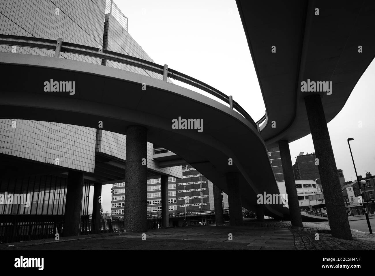 The curved ramps leading up to the car park at Preston Bus Station, a well known example of Brutalist Architecture. Stock Photo