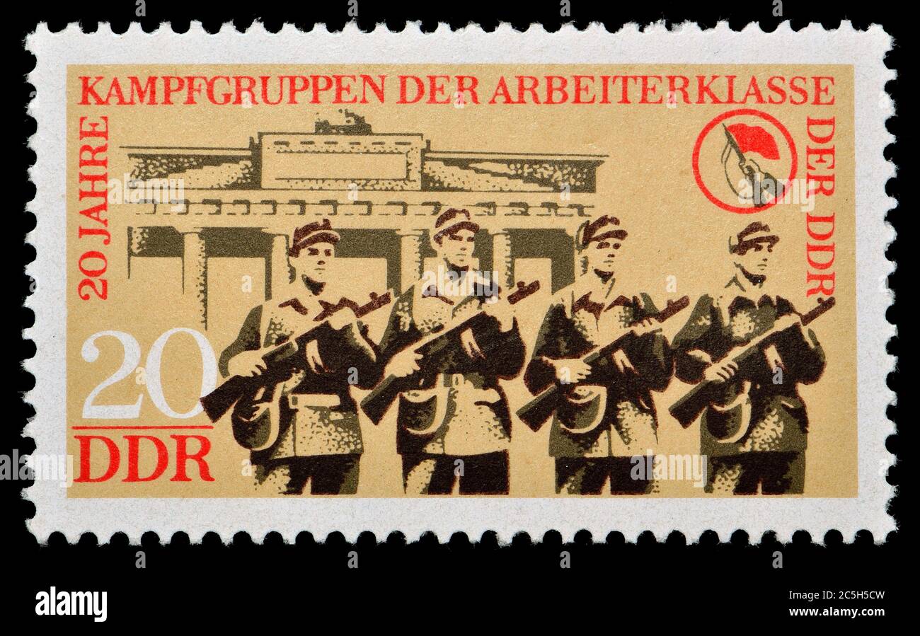 East German postage stamp (1973) : 20 years of the Combat Groups of the Working Class (Kampfgruppen der Arbeiterklasse, KdA) paramilitary organization Stock Photo