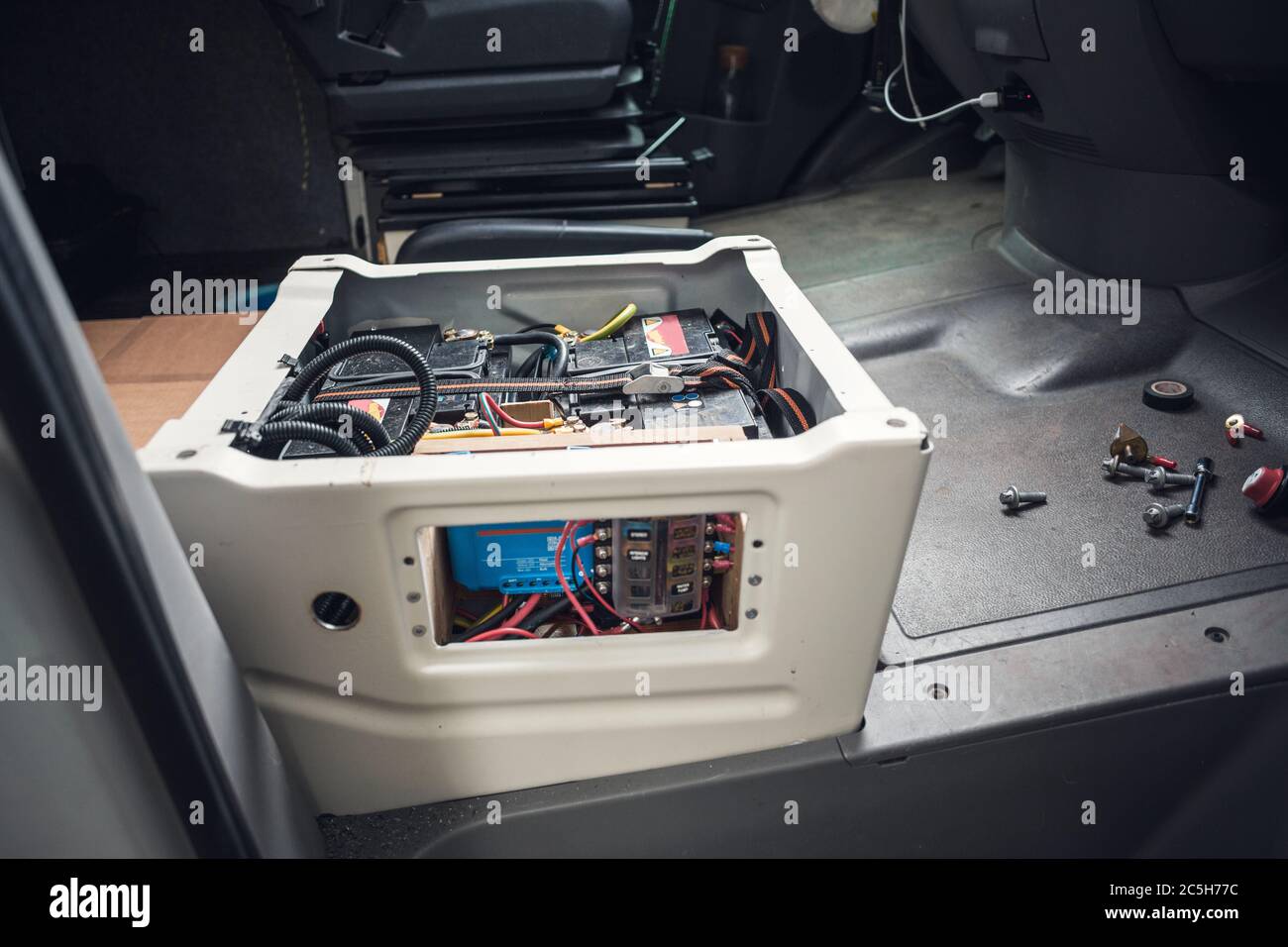Electronics build into the front seat of a camper van Stock Photo