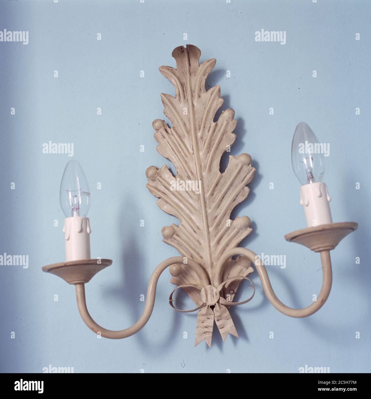 Wall lighting fixture with candle bulbs Stock Photo