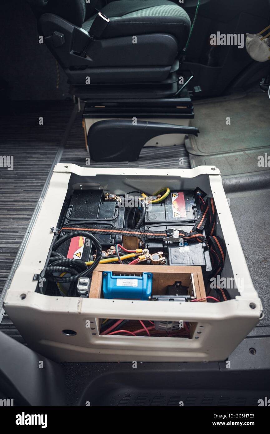 Battery build into the front seat of a camper van Stock Photo
