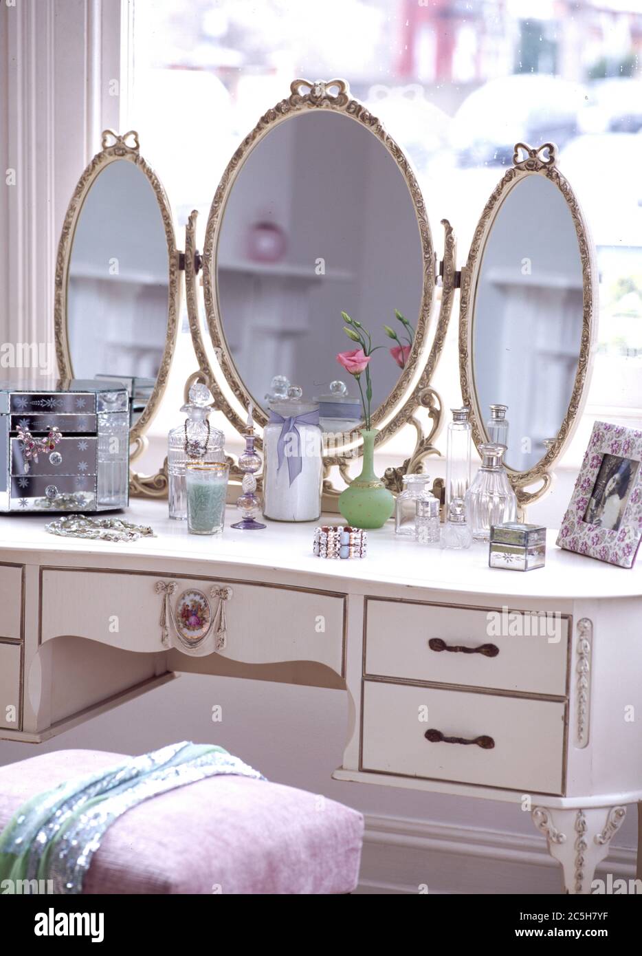 Closeup of dressing table with triple mirror Stock Photo Alamy