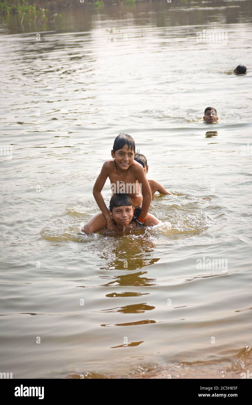 3 boys bathing