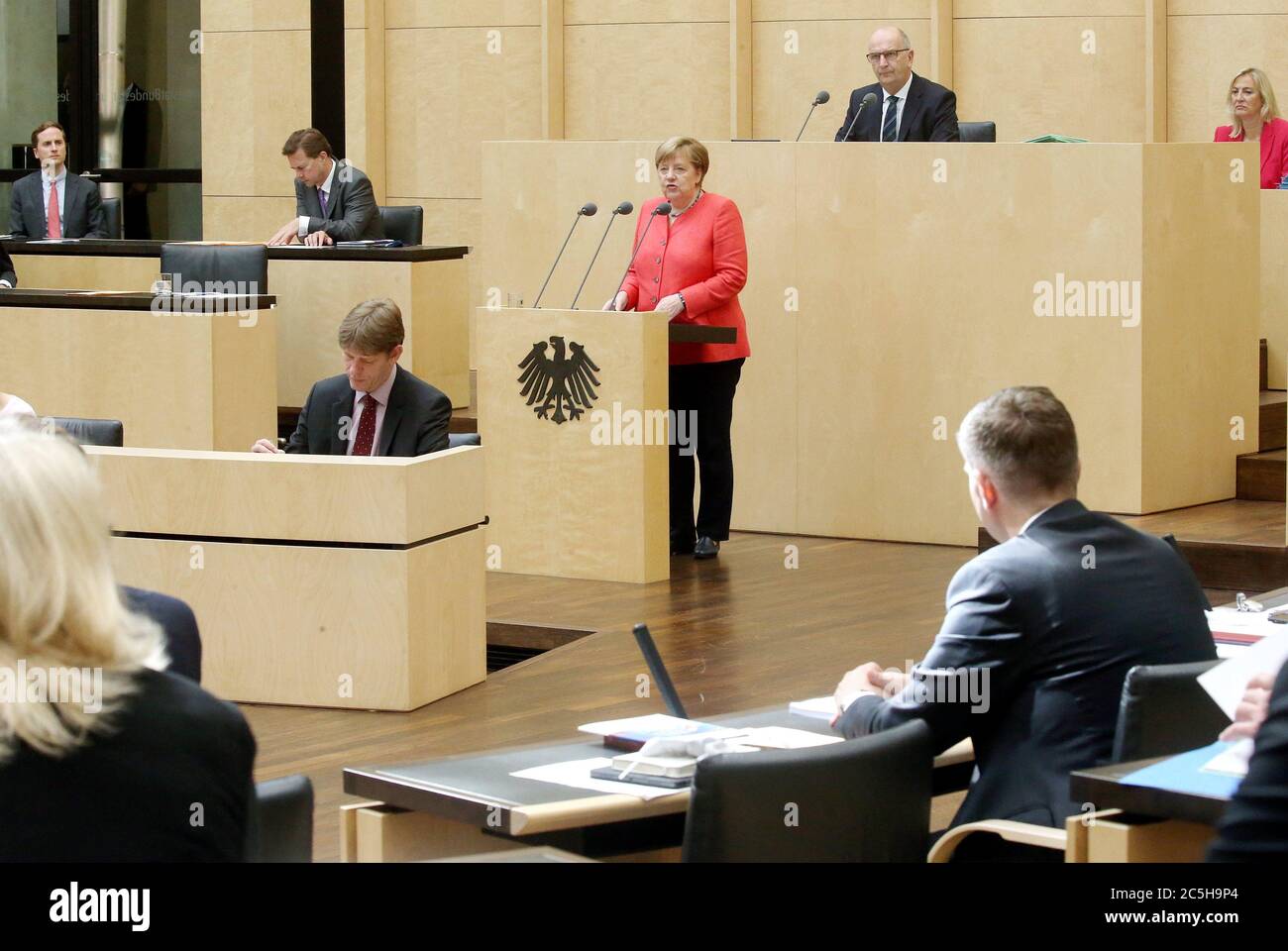 Berlin, Germany. 03rd July, 2020. Chancellor Angela Merkel (CDU, M) gives a speech in the Bundesrat on the objectives of the EU Council Presidency, Dietmar Woidke (SPD, top, 2nd from right), President of the Bundesrat, follows the speech. Credit: Wolfgang Kumm/dpa/Alamy Live News Stock Photo