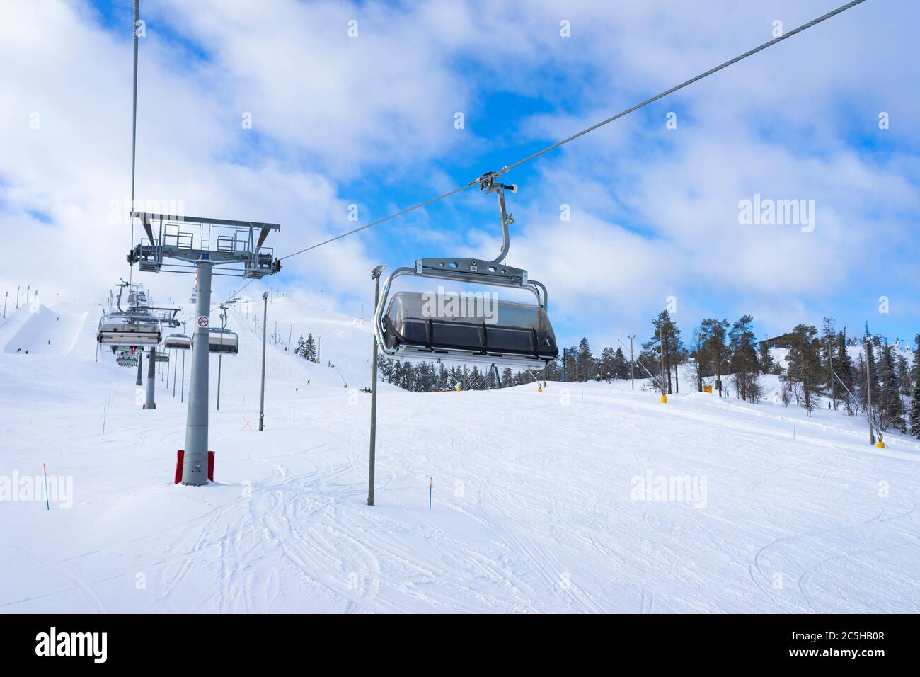 Ski slope with ski lifts on the ski resort in Finland, Ruka Stock Photo
