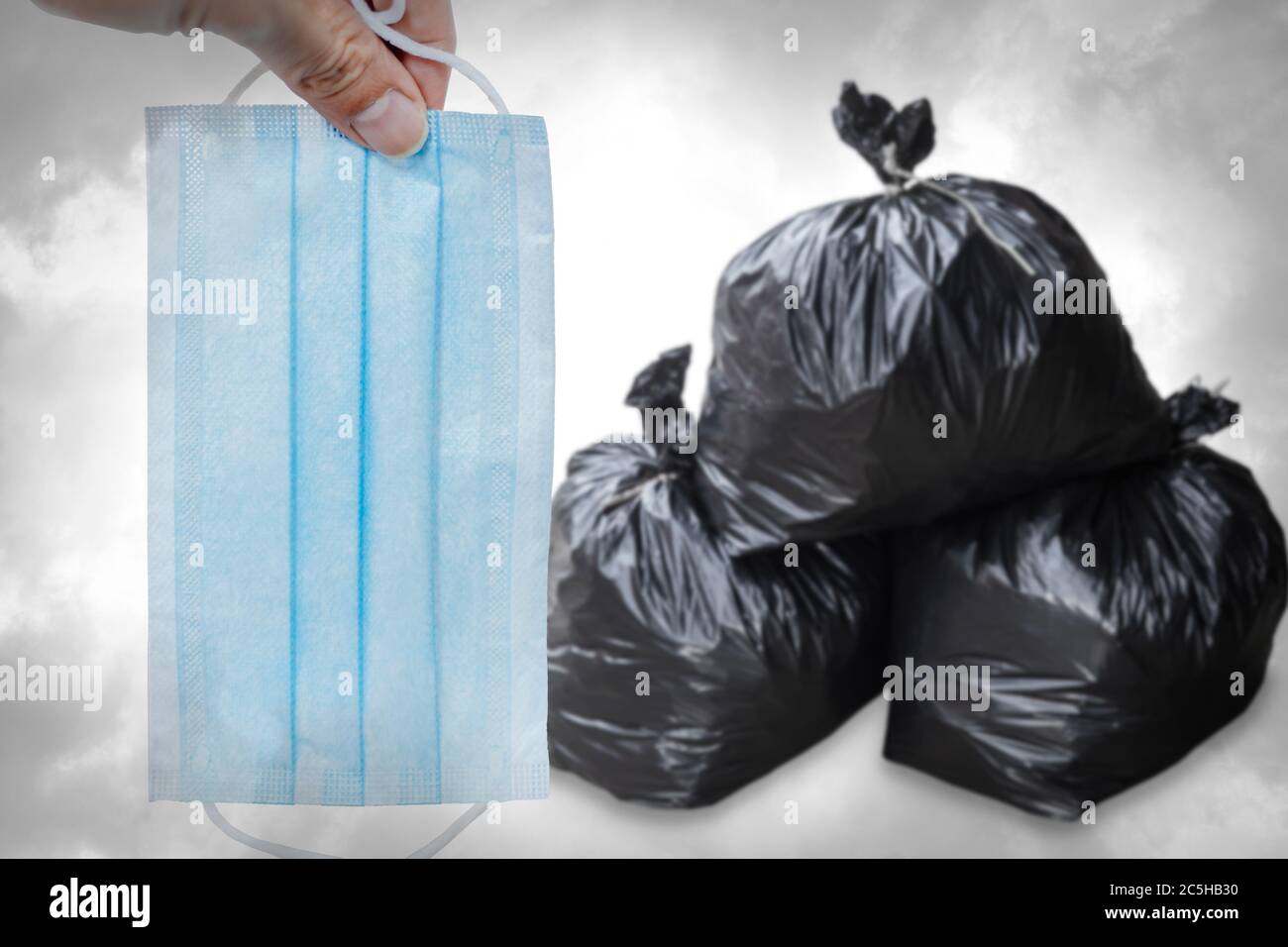 Throwing away of used disposable face masks or infected face shield in