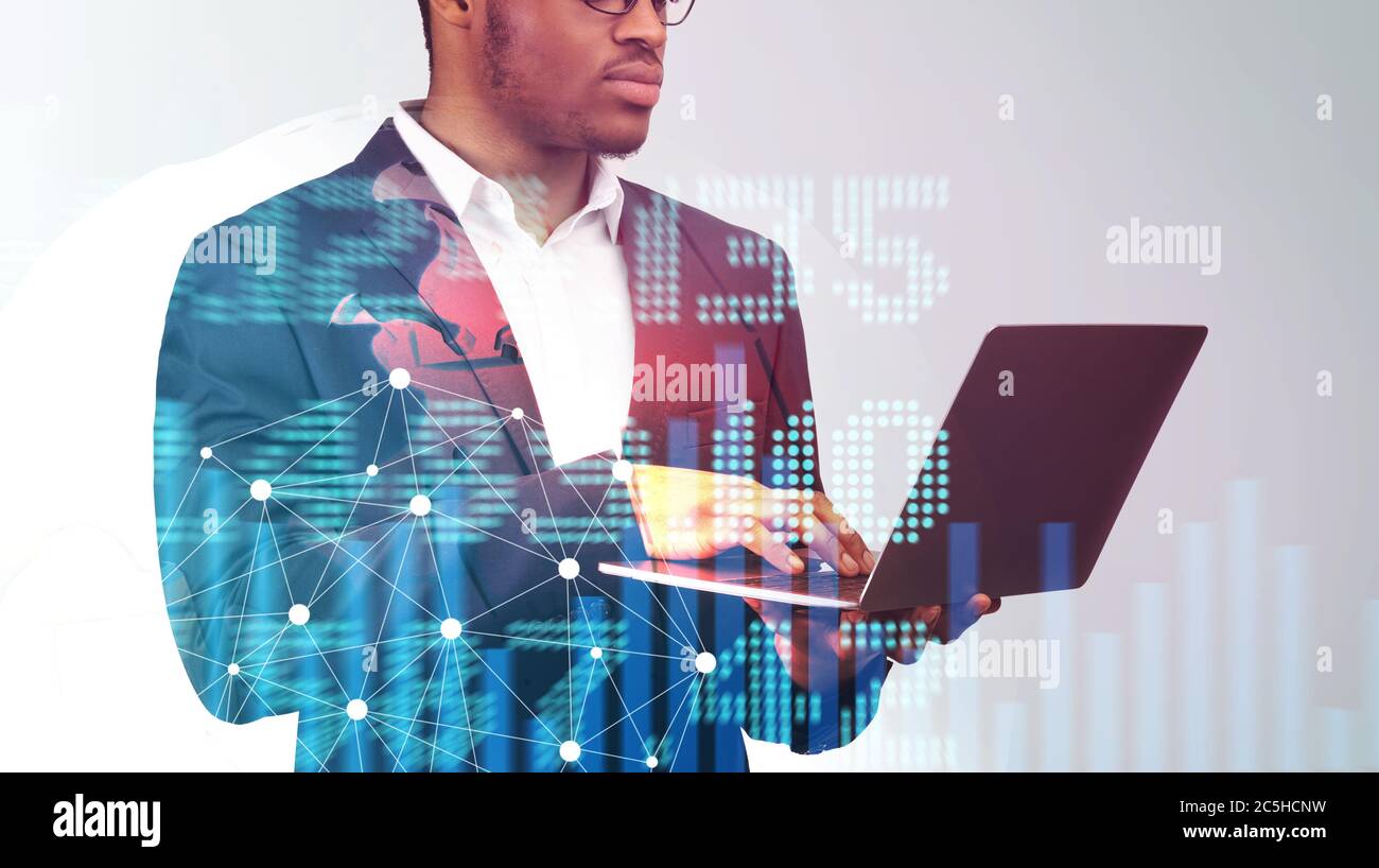 African American Entrepreneur Using Laptop Computer Creative Collage With Stock Numbers And Graphs Stock Photo Alamy