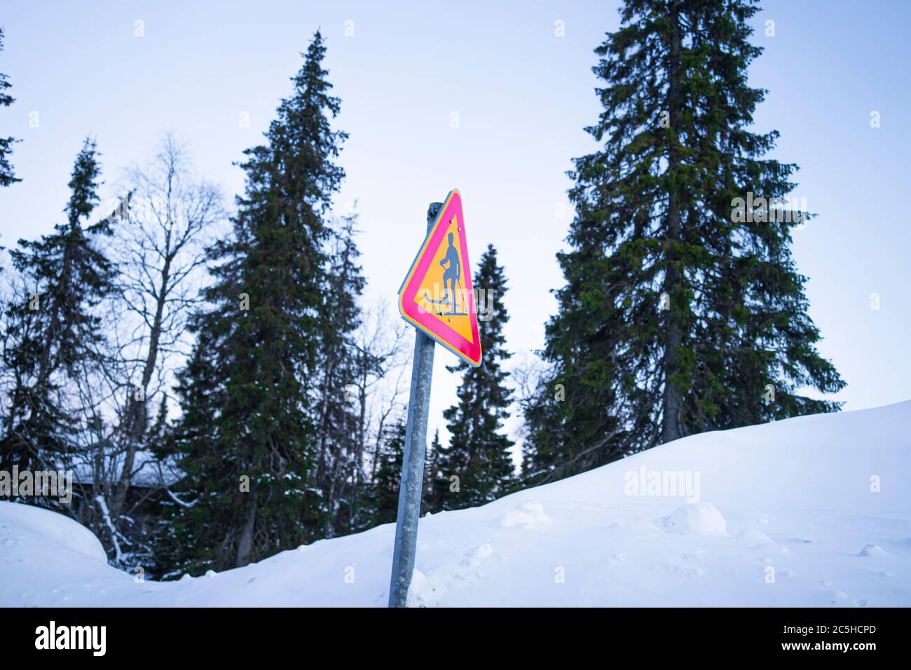 Red and yellow road sign with skier Stock Photo