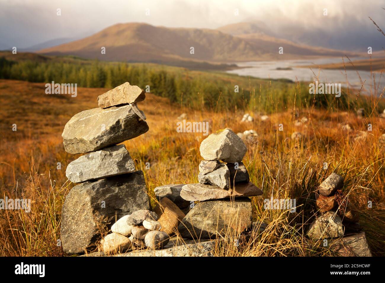 Stone stacks in the Scottish Highlands, overlooking the Ardochy Forest towards Loch Garry, Scotland, UK Stock Photo