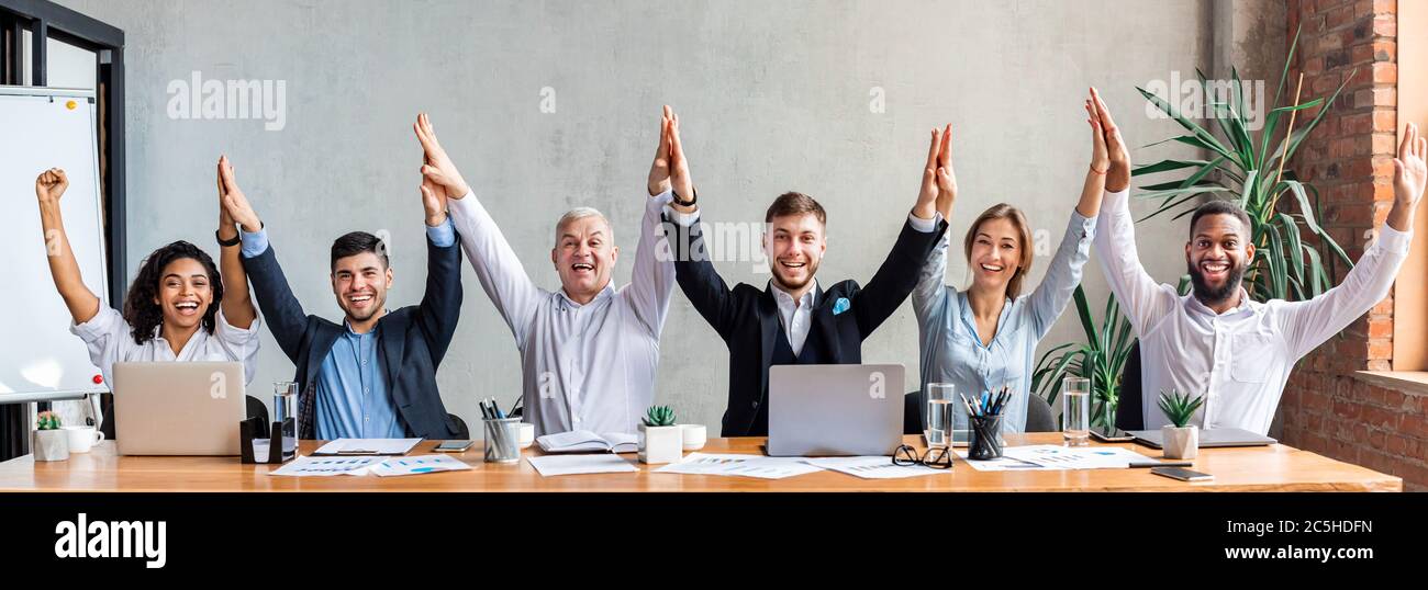Happy Colleagues Celebrating Business Success Giving High-Five In ...