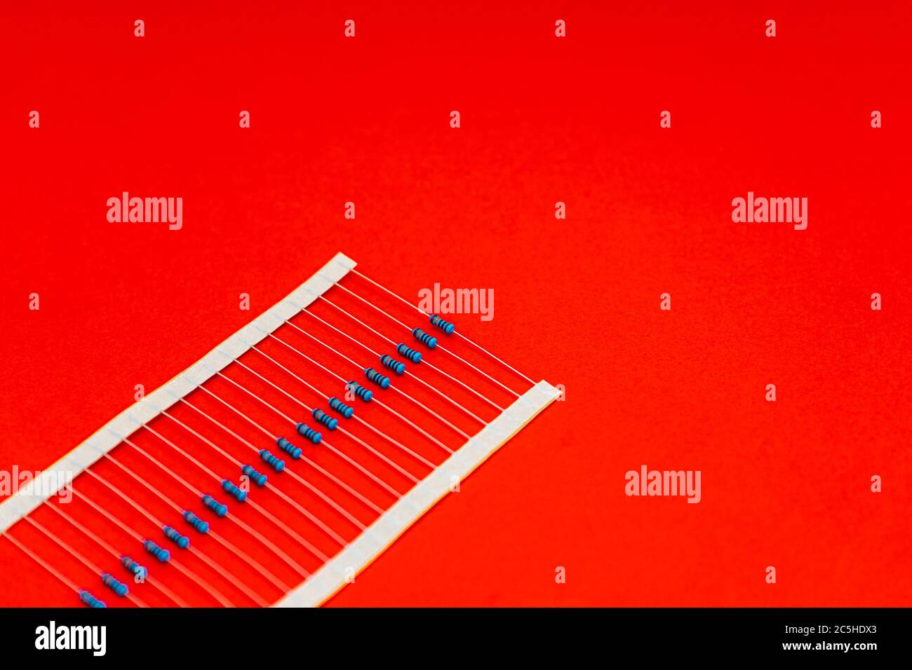 Electronic components for projects, resistors pack over red background Stock Photo