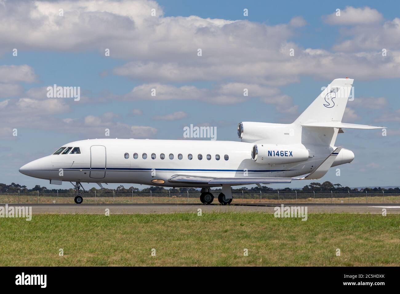 Dassault Falcon 900EX Business jet N146EX on the runway at Avalon Airport. Stock Photo