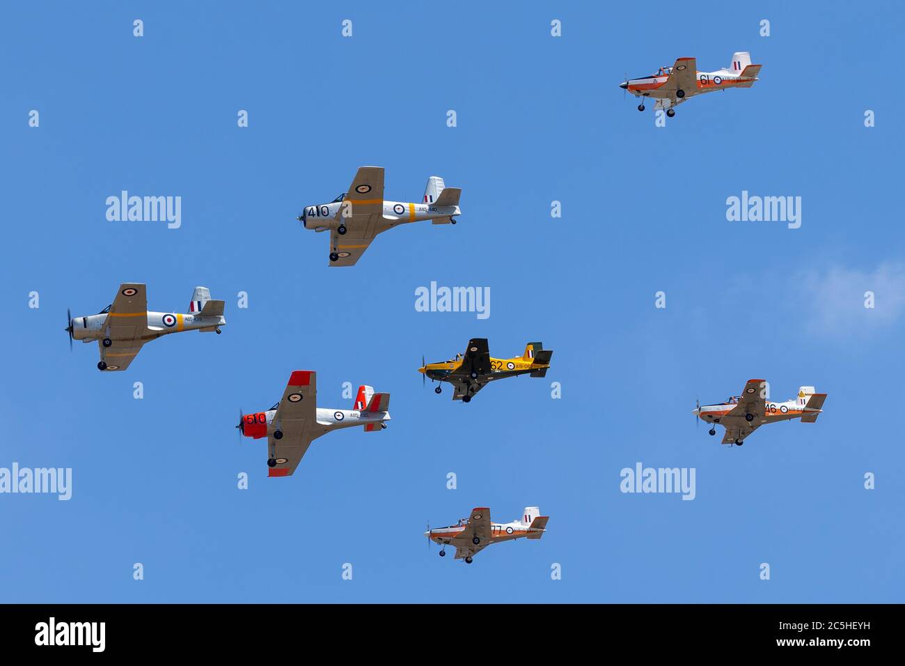 Commonwealth Aircraft Corporation CA-25 Winjeel aircraft leading a formation of former Royal Australian Air Force trainer aircraft. Stock Photo